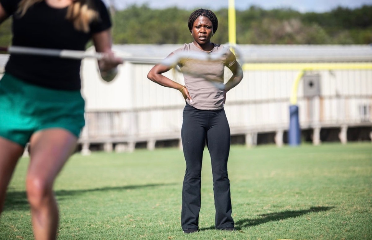 Coach Pendo watching athlete training